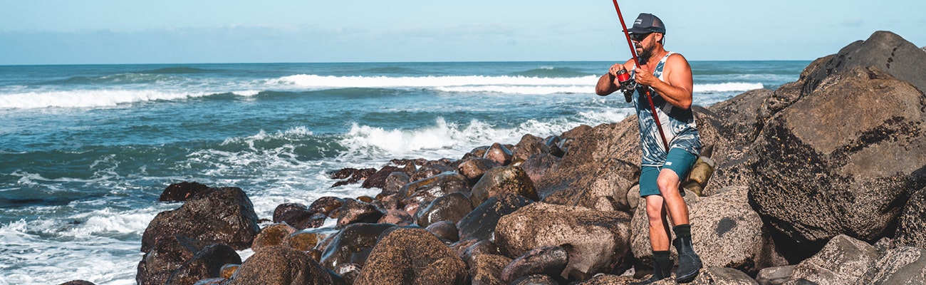 Fisher Surfcasting From The Rocks